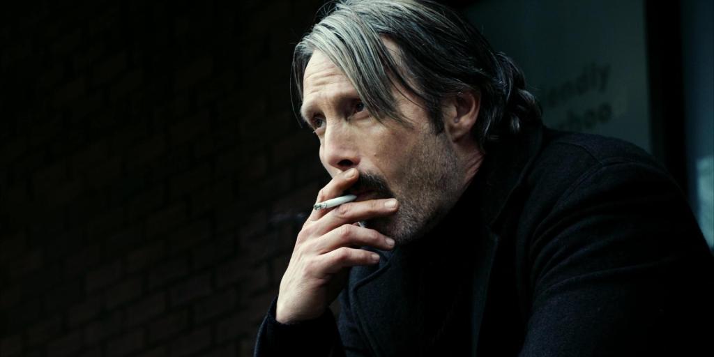 Duncan (Mads Mikkelsen) having a smoke.
