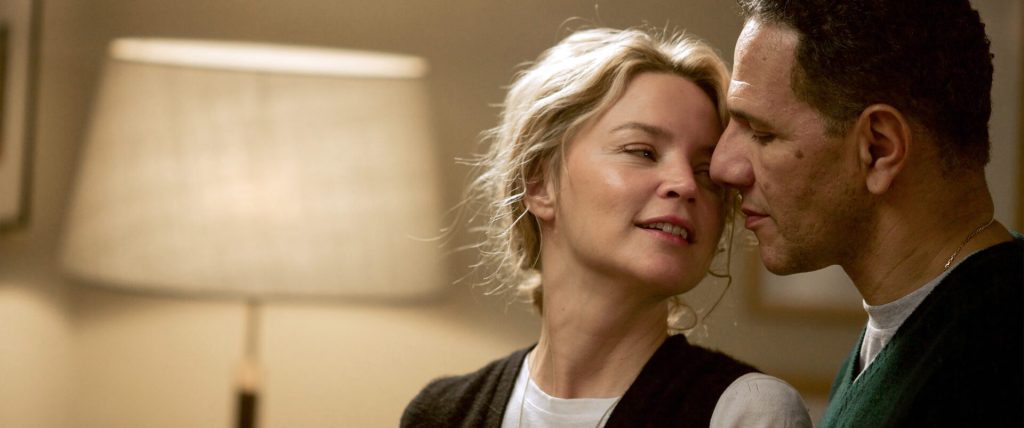 Rachel (Virginie Efira) leaning into Ali (Roschdy Zem).