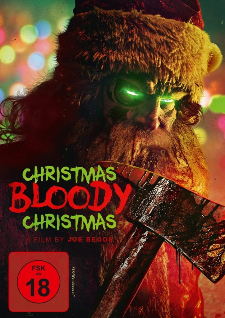 The film poster showing Santa (Abraham Benrubi) covered in blood, his eyes glowing green and holding a bloody axe.