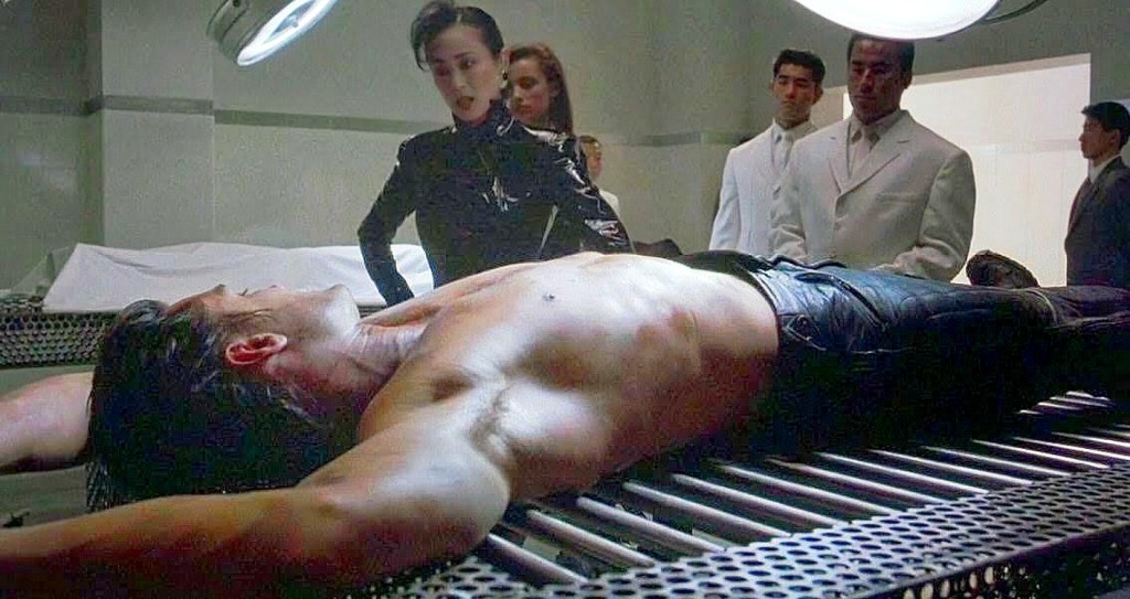 The Punisher (Dolph Lundgren) readied for torture by Lady Tanaka (Kim Miyori). 