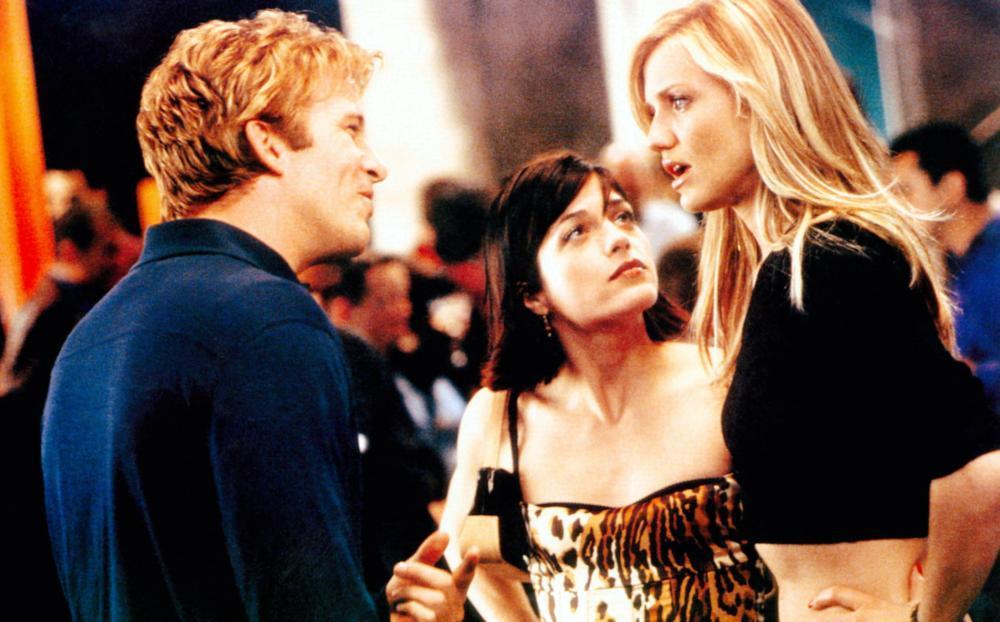Peter (Thomas Jane) and Christina (Cameron Diaz) facing off, with Jane (Selma Blair) looking admiringly at Christina.