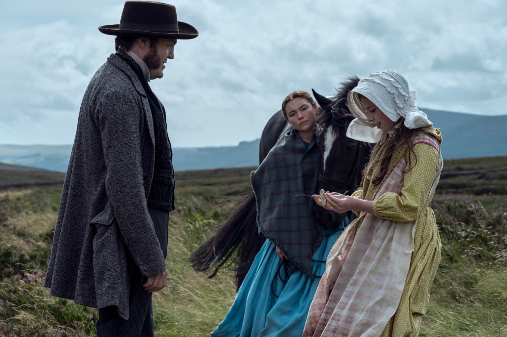 Lib (Florence Pugh) and Anna (Kíla Lord Cassidy) talking to William (Tom Burke). 