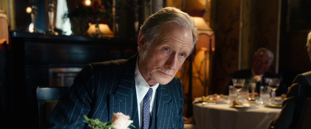 Williams (Bill Nighy) in a fancy restaurant.