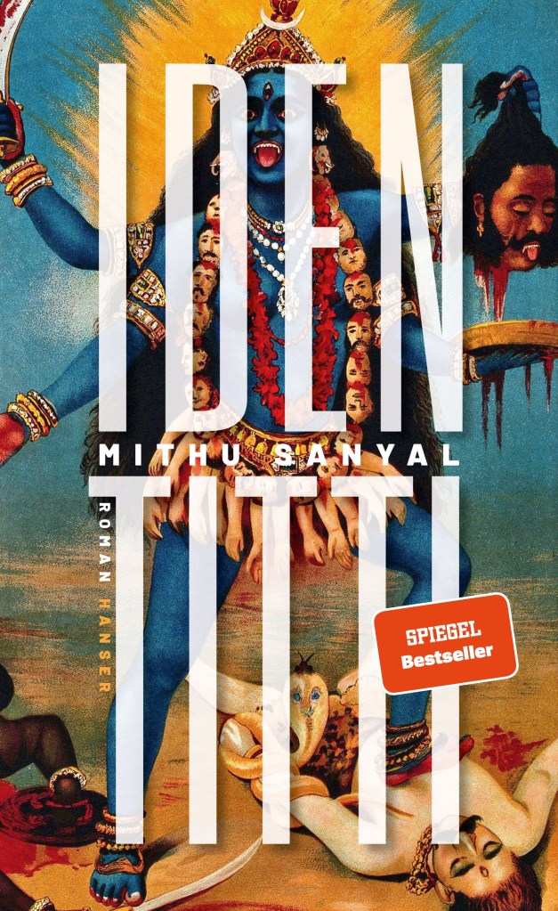 The book cover showing the Indian goddess Kali. Tongue showing, she is blue-skinned and has four arms, one holding a man's head. She is wearing a necklace of decapitated heads and a skirt of arms. She is stomping on a man lying on the ground, a snake wrapped around his arm.