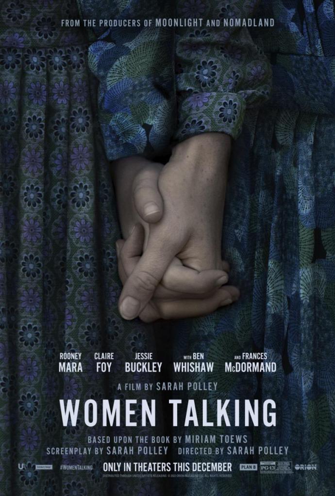 The film poster showing two clasped hands in front of two blue skirts with different patterns.