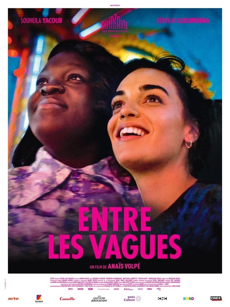 The film poster showing Alma (Déborah Lukumuena) and Margot (Souheila Yacoub) at a carnival, looking upward.
