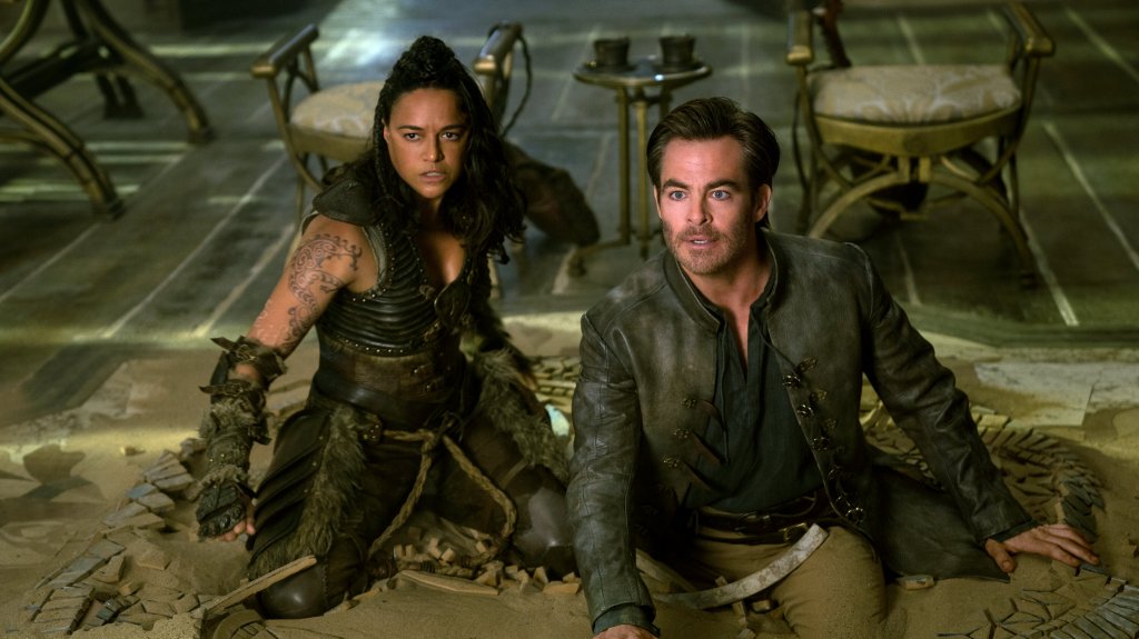 Holga (Michelle Rodriguez) and Edgin (Chris Pine) stuck in the floor.