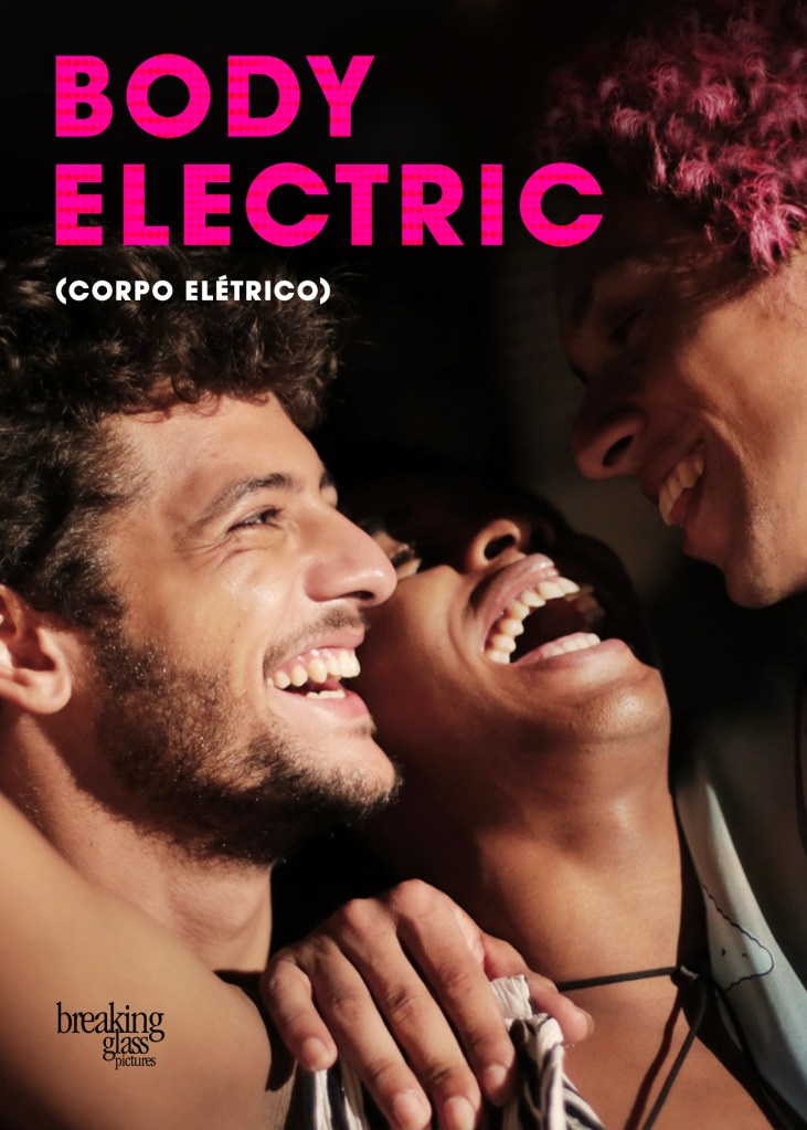 The film poster showing Elias (Kelner Macêdo) dancing closely and laughing with Wellington (Lucas Andrade) and a friend of Wellington's. 