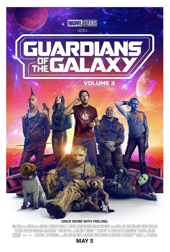 The film poster showing the Guardians arranged in a group in front of a colorful background of planets and stars.