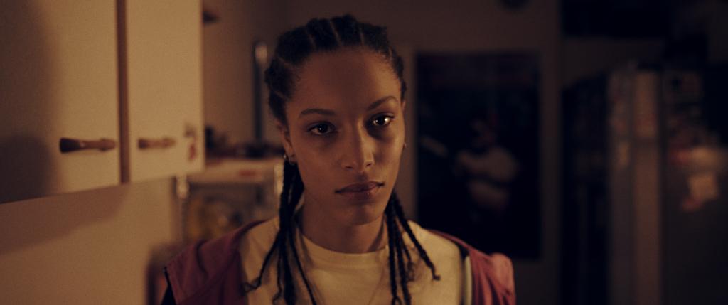 Assitan (Angèle Mac) looking very serious. 