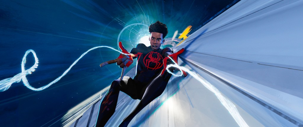 Miles Morales (Shameik Moore) sliding down something while shooting webs from his wrist.