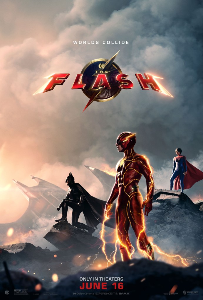 The film poster showing The Flash (Ezra Miller), Batman (Michael Keaton) and Supergirl (Sasha Calle) standing on some debris.