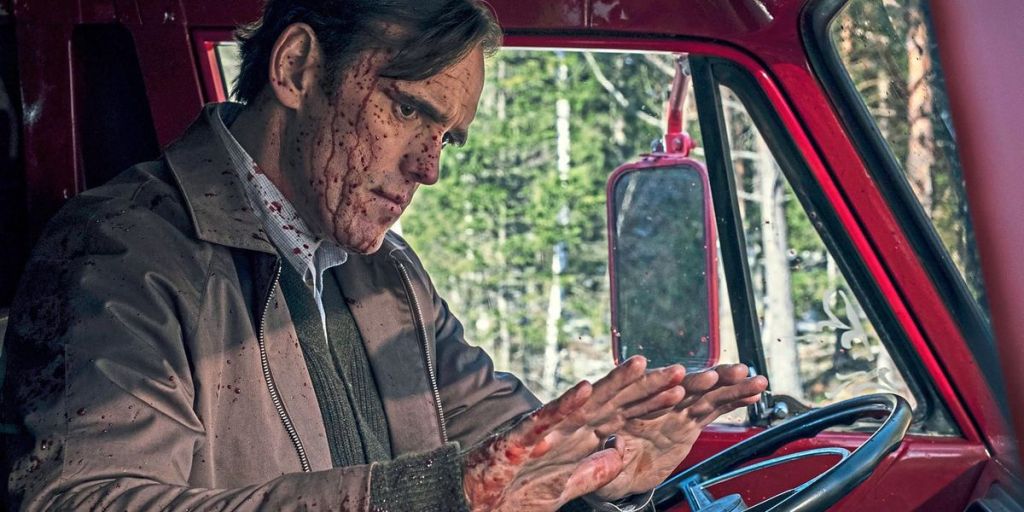Jack (Matt Dillon) sitting in his car, splattered with blood, looking at his hands.