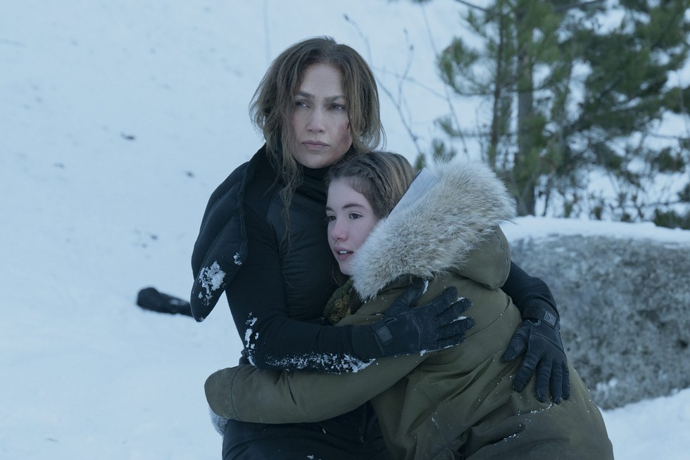 The Mother (Jennifer Lopez) hugging Zoe (Lucy Paez) tightly.