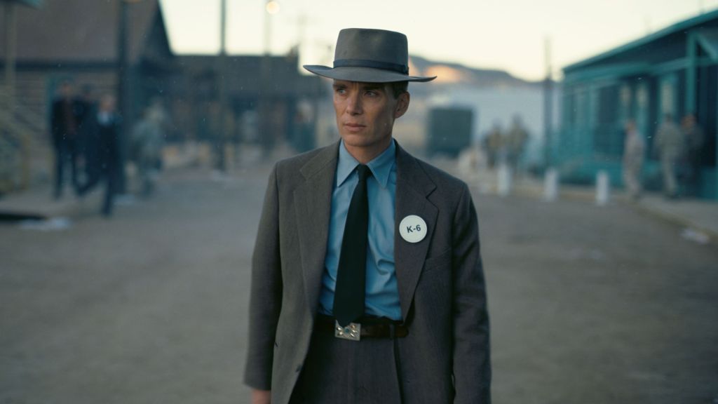 Oppenheimer (Cillian Murphy) walking through his research village.