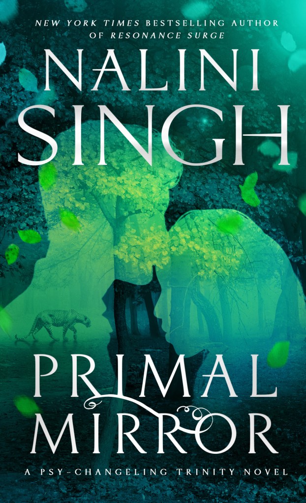The book cover showing the silhouette of man kissing a woman on the forehead, superimposed over a leopard walking through a forest.