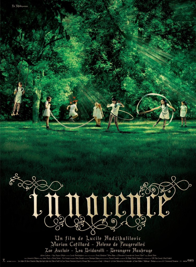 The film poster showing a group of 8 girls playing in a forest. All are dressed in white and their hair is tied with colorful ribbons.