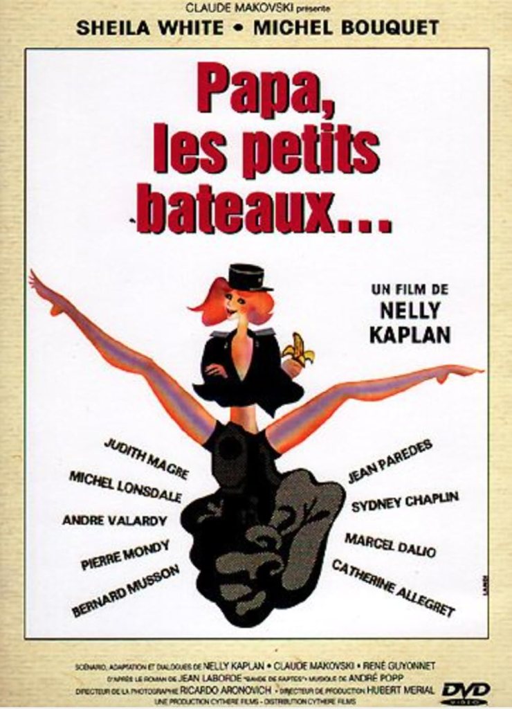 The movie poster showing a fist clenching a gun, above which rides a woman in a stripper-like police uniform, her legs spread, eating a banana
