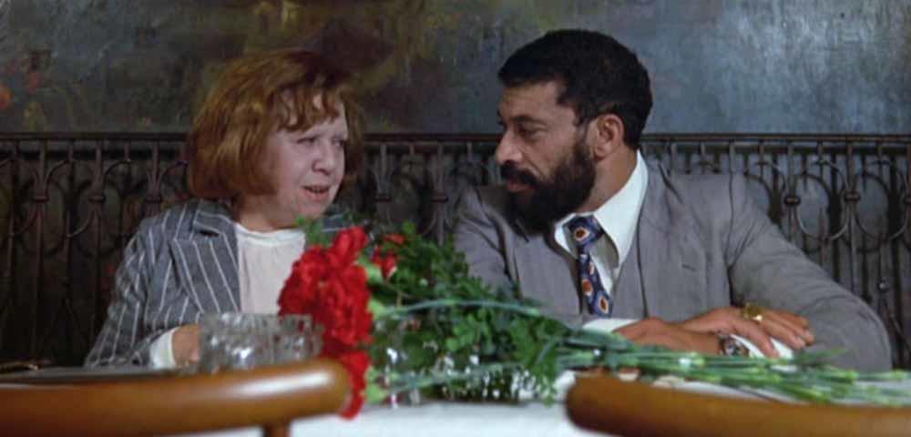 Emmi (Brigitte Mira) and Ali (El Hedi ben Salem) at their wedding lunch.