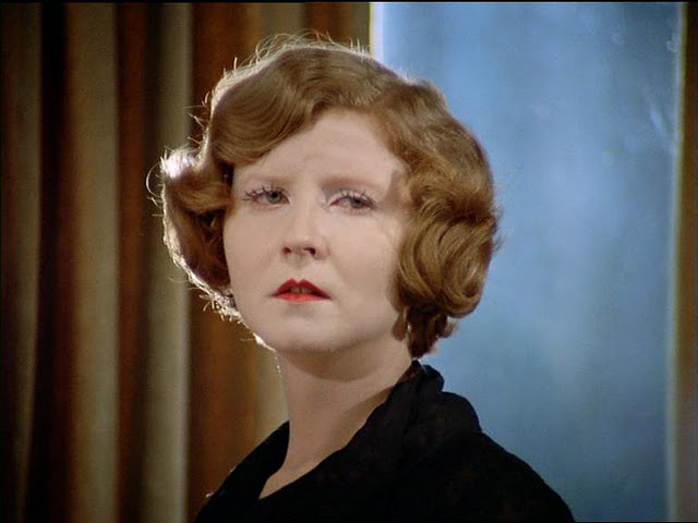 Marlene (Irm Hermann) with tears in her eyes.