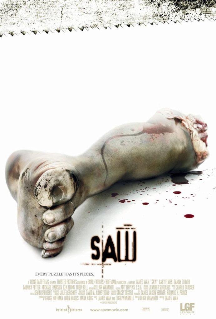 The movie poster showing a severed foot and the edge of a saw.