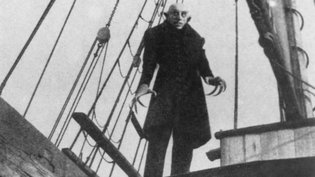 Orlok (Max Schreck) standing on the ship Demeter. 