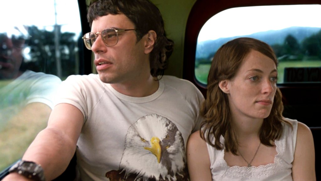 arrod (Jemaine Clement) and Lily (Loren Taylor) in a bus together.