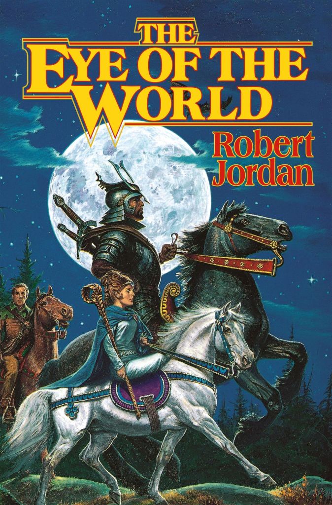 The book cover showing three people on horseback riding under a full moon: a knight on a giant black horse, a woman with an ornate staff on a tiny white horse and a mN ON  brown horse behind them.