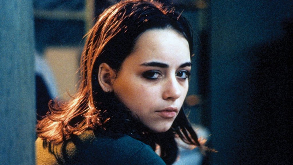 Rita (Barbara Osika) looking back over her shoulder.