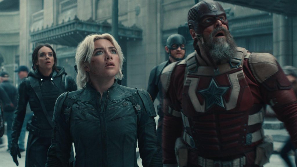 Yelena (Florence Pugh) and Alexei (David Harbour) looking up at the sky, their mouths hanging open.