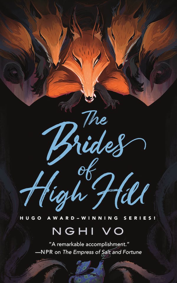 The book cover showing three foxes looking sly and a teapot.