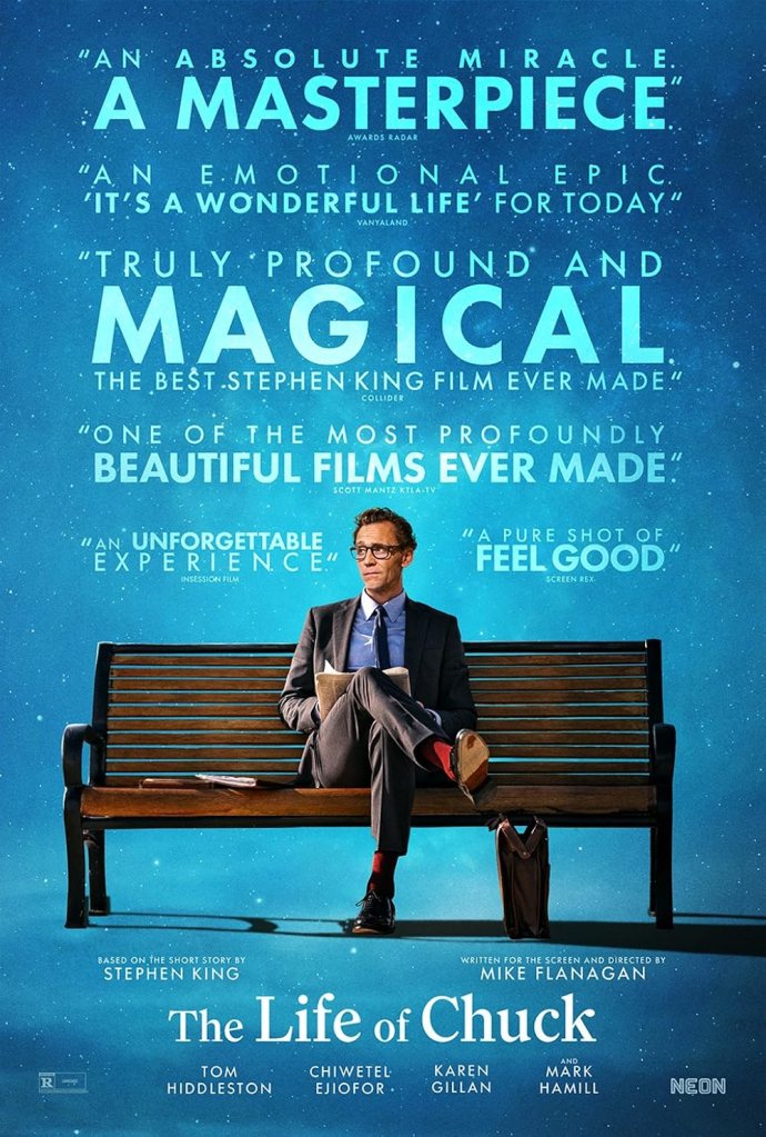 The movie poster showing Chuck (Tom Hiddleston) sitting on a park bench, reading a newspaper in front of a star-studded background. 