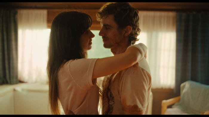 Tim (Dave Franco) and Millie (Alison Brie) dancing in their living room.