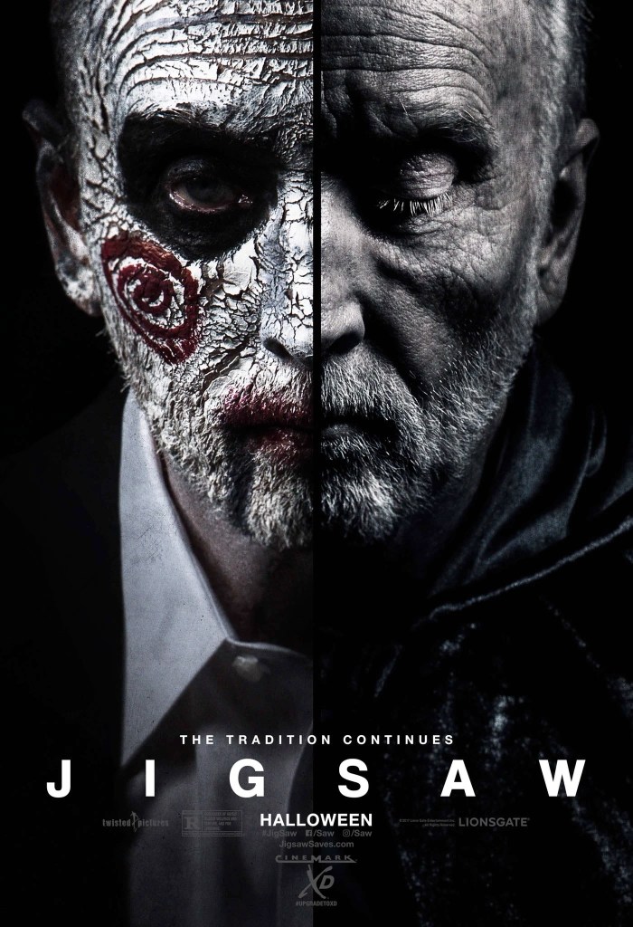 The movie poster showing Jigsaw (Tobin Bell) in close-up. His face is divided. One half has cracked white make-up and a red spiral on his cheek, one half shows him with his eye closed and without any make-up.