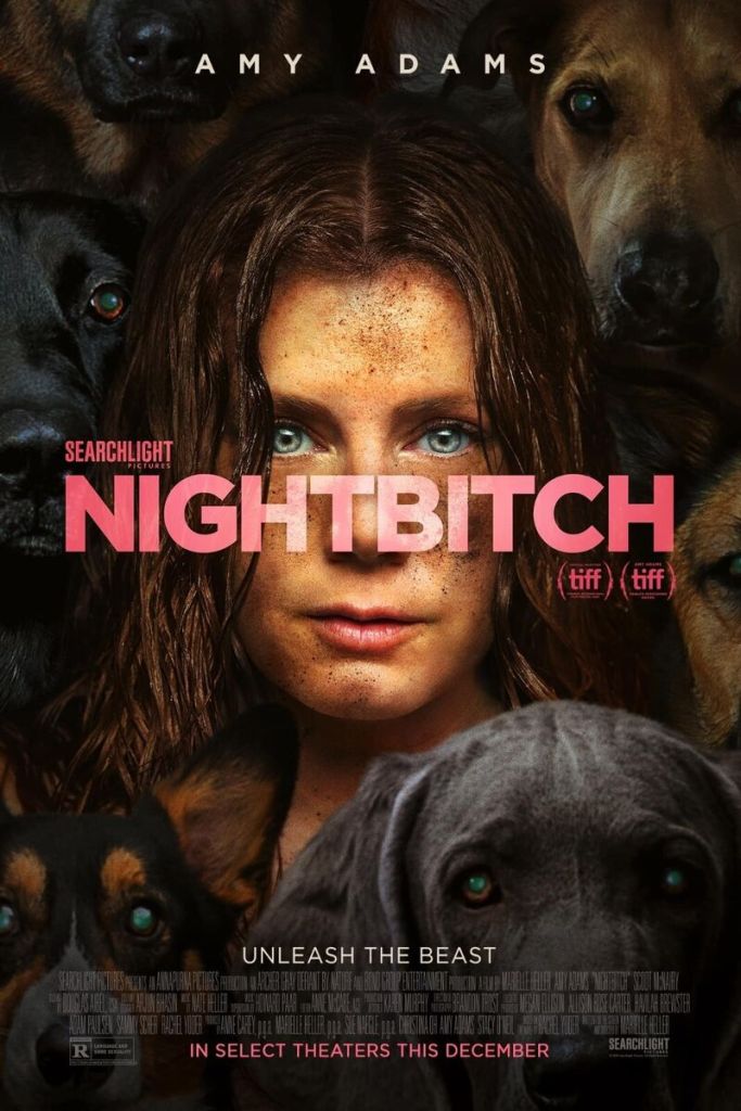 The movie poster showing The Mother (Amy Adams) with a dirty face, surrounded by dog heads.