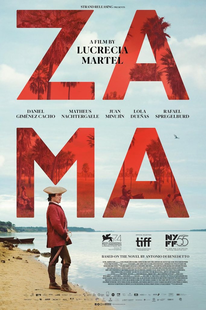 The movie poster showing Zama (Daniel Giménez Cacho) standing at a beach, looking out over the sea.