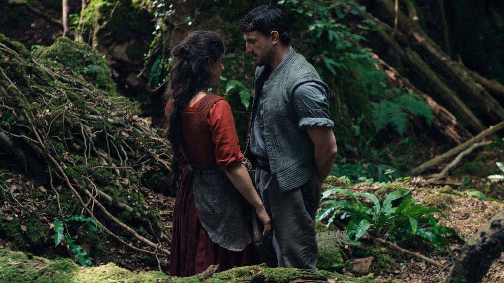 Agnes (Jessie Buckley) and Will (Paul Mescal) standing close to each other in the forest.
