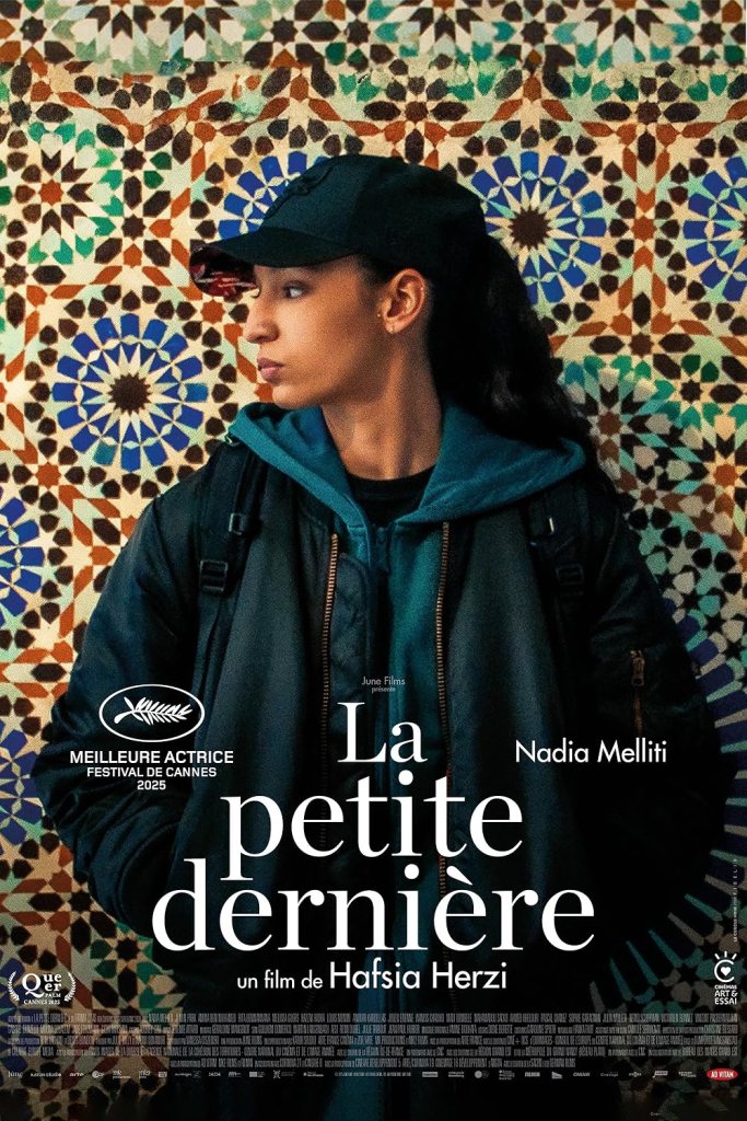 The movie poster showing Fatima (Nadia Melliti) standing in front of a colorful mosaic. She is wearing dark clothing and a baseball cap and is looking to the side with a serious expression.
