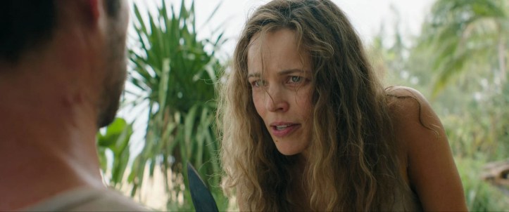 Linda (Rachel McAdams) holding a big knife, looking disheveled.