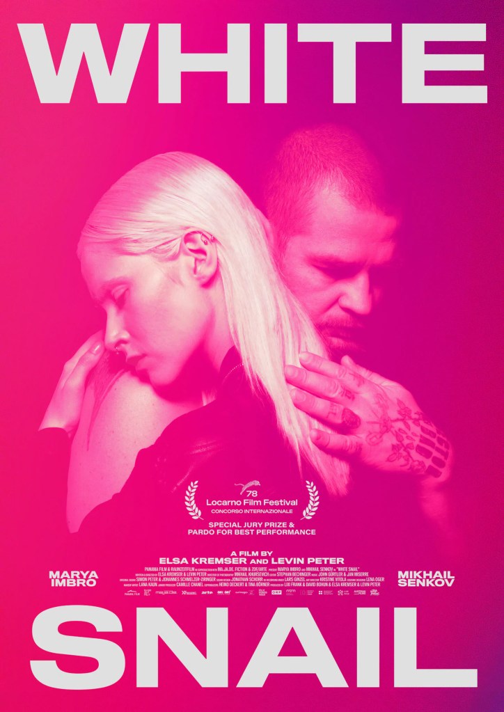 The movie poster all in pink, showing Masha (Marya Imbro) and Misha (Mikhail Senkov) hugging. 