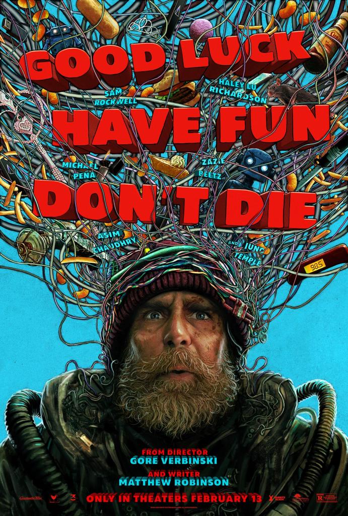 The movie poster showing a man (Sam Rockwell) with an unkempt beard and tubes running over his shoulders. He is wearing a beanie wrapped in cables. Those cables extend upwards and wrap around various things that feature in the film, from a rat to pie to a toy robot.