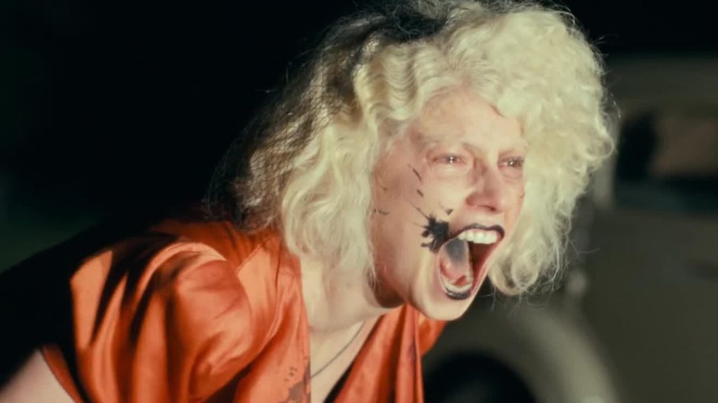 The Bride (Jessie Buckley) screaming with tears in her eyes.