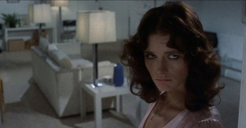 Danielle (Margot Kidder) looking somewhat dark, almost dangerous.