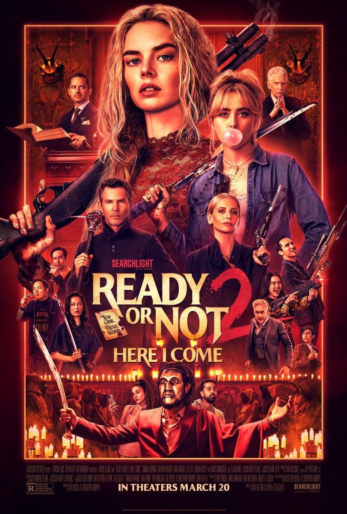 The film poster showing the main characters of the film, almost all of them brandishing different weapons. Front and center is Grace (Samara Weaving), next to her her sister Faith (Kathryn Newton). 