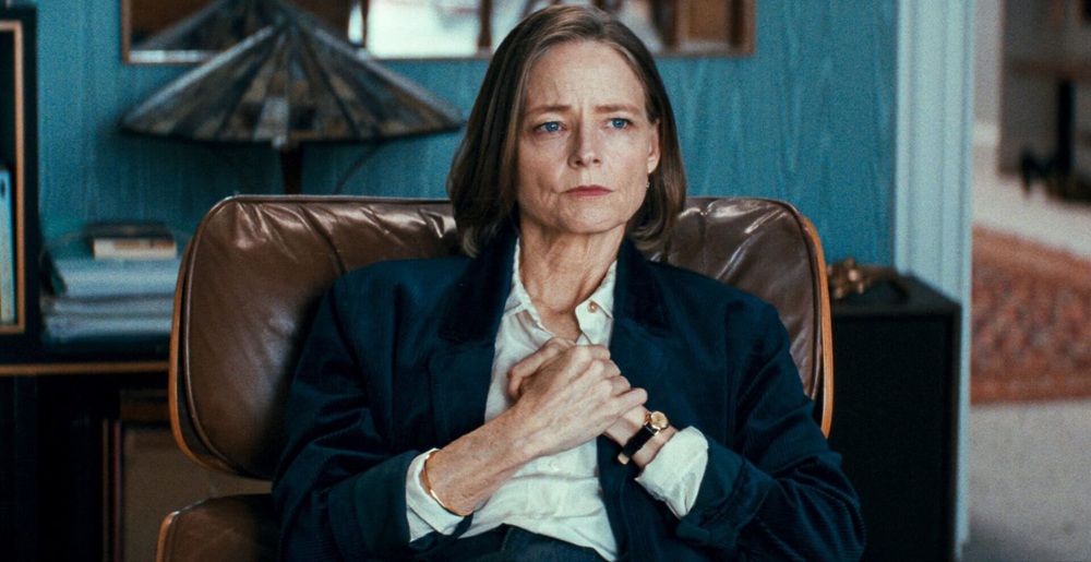 Lilian (Jodie Foster) sitting in her chair, looking off into the distance.